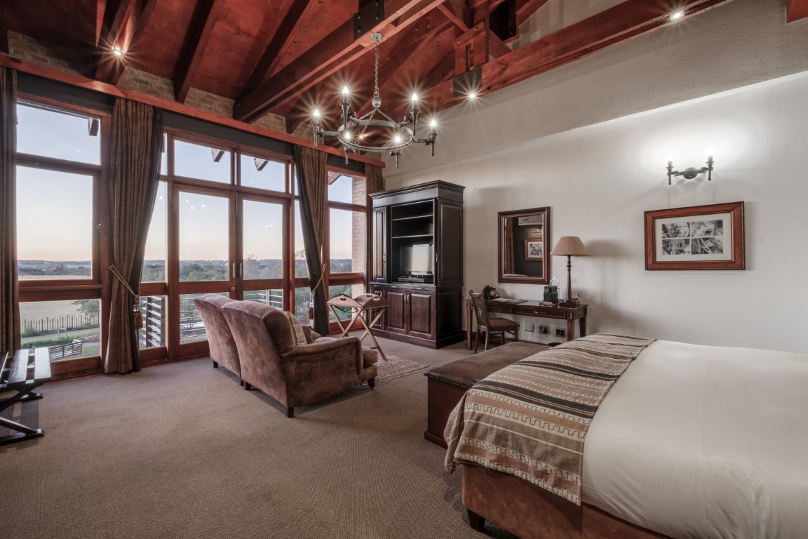 A spacious Riboville suite with warm timber details